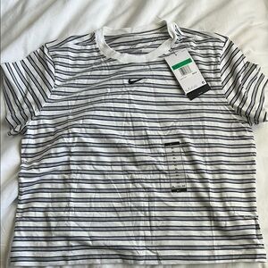 Never worn Nike women’s Black and White Striped Shirt